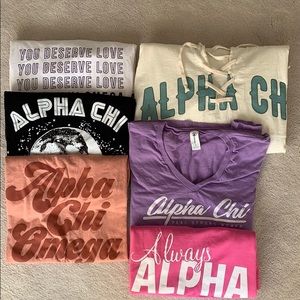 A bundle of Alpha Chi Omega shirts